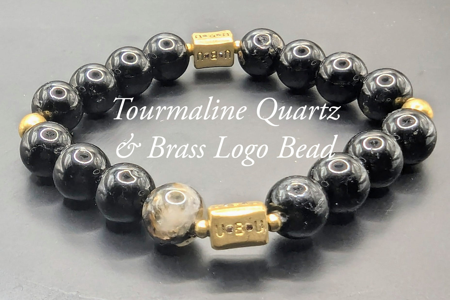 UBU Signature Quartz Laced Tourmaline & Brass Logo Beads
